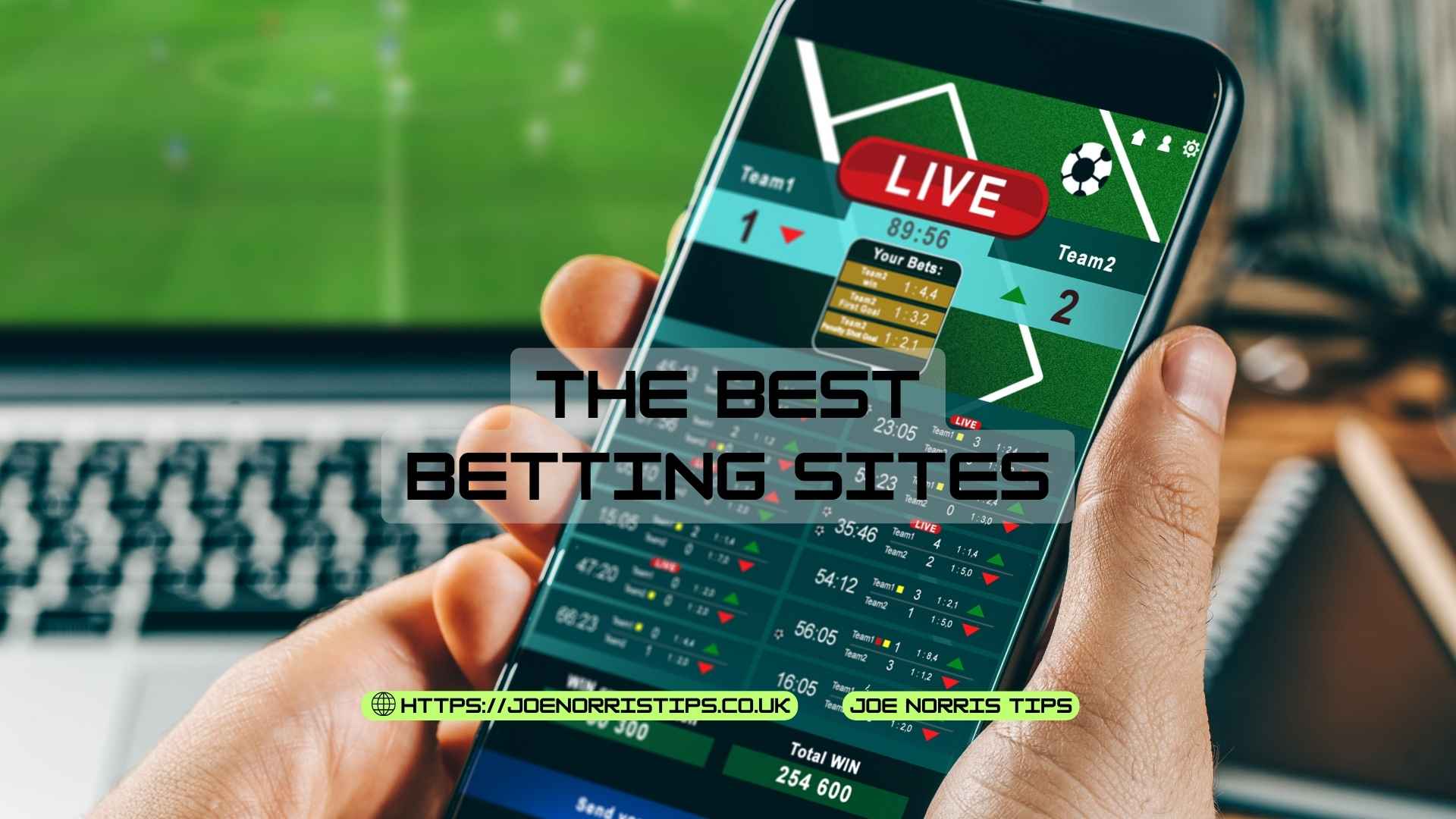 Person holding smartphone displaying live sports betting app interface with text 'The Best Betting Sites.